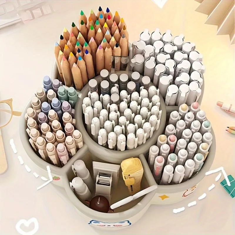  Bird's eye view of gray rotating desk organizer filled with colored pencils markers and pens in all six compartments with small stationery accessories on a styled desk