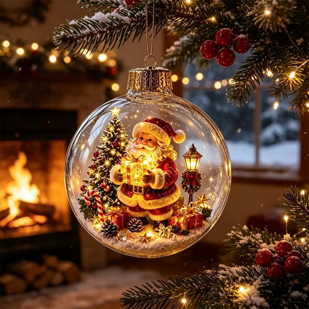 A clear Christmas ornament ball hanging from a decorated tree branch, featuring a glowing Santa Claus figure inside with a miniature tree, gifts, and warm lights. A blurred fireplace and snowy outdoor scene appear in the background.