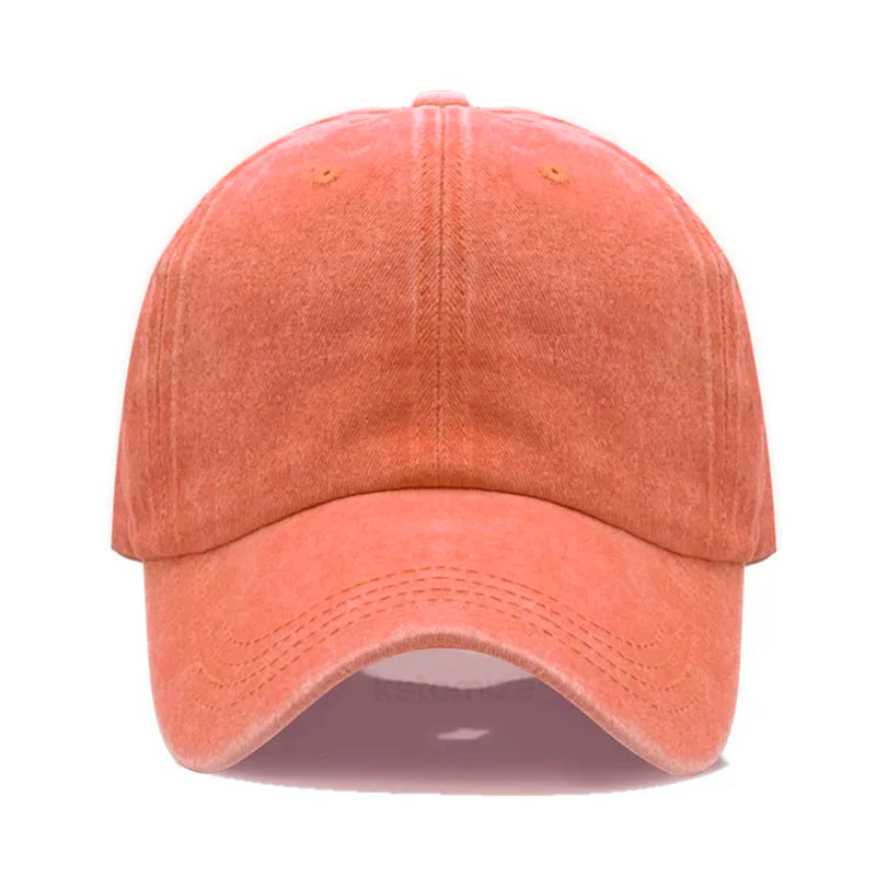 Orange baseball cap on a white background