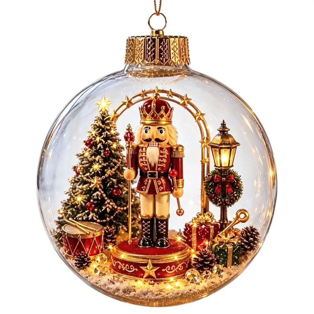 A clear glass Christmas ornament shaped like a nutcracker soldier, featuring a detailed holiday diorama with a miniature Christmas tree, golden arch, lantern, gifts, and warm white string lights inside a transparent spherical ornament on a white background.