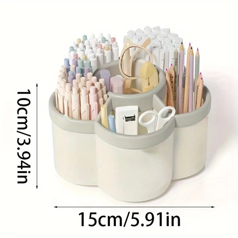 White rotating 6-compartment desk organizer with dimensions 15cm wide by 10cm tall shown filled with pens markers and colored pencils on white background